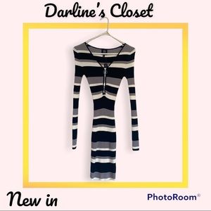 Lined long sleeve midi dress.